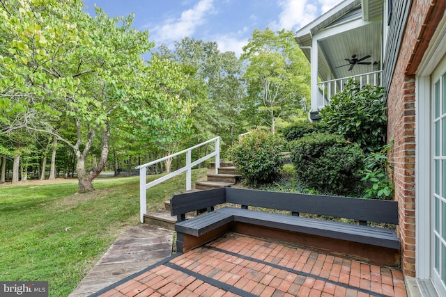 view of patio / terrace featuring ceiling fan