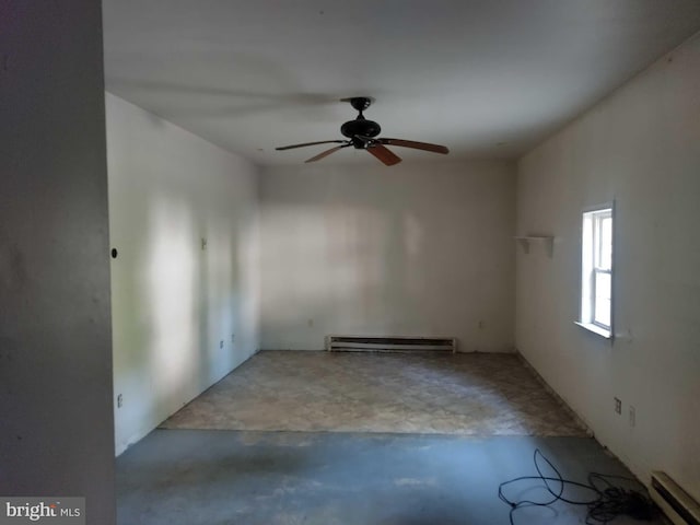 unfurnished room with baseboard heating, concrete flooring, a baseboard heating unit, and a ceiling fan