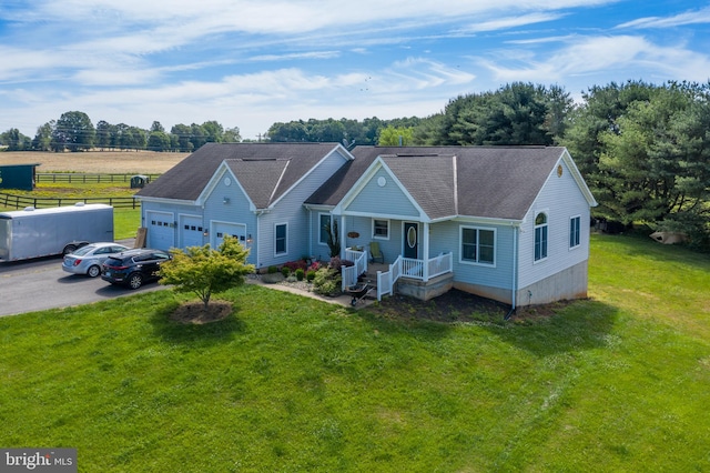 ranch-style home with covered porch and a front lawn