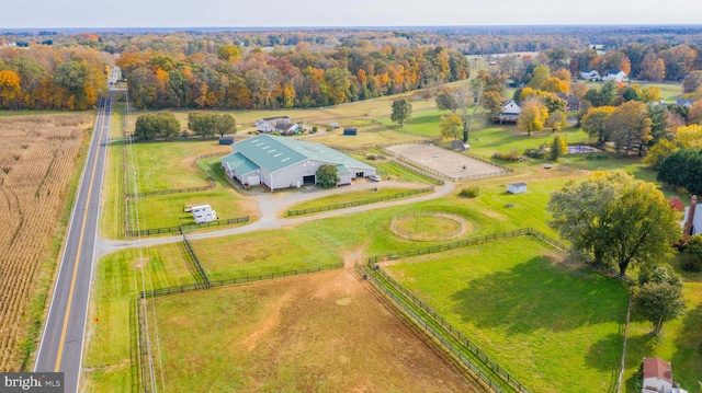 birds eye view of property featuring a rural view