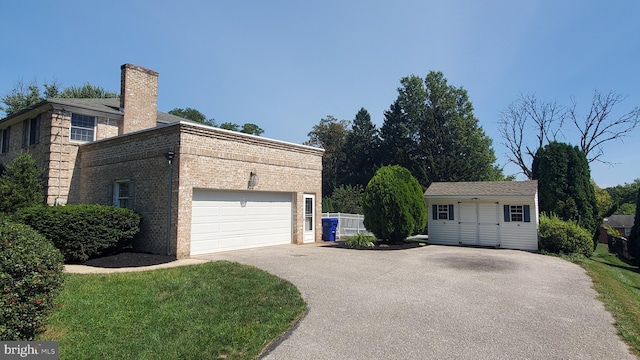 ranch-style home featuring a garage