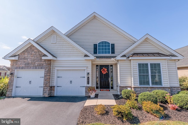 view of front of home featuring a garage