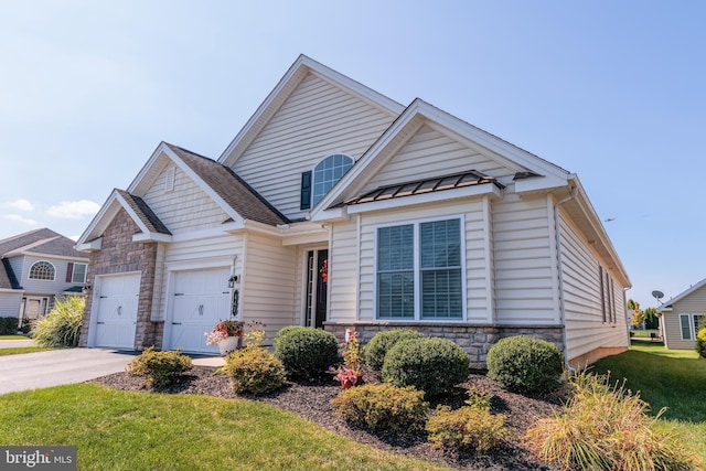 view of front facade with a front lawn and a garage