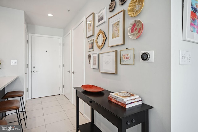 foyer entrance featuring light tile patterned floors