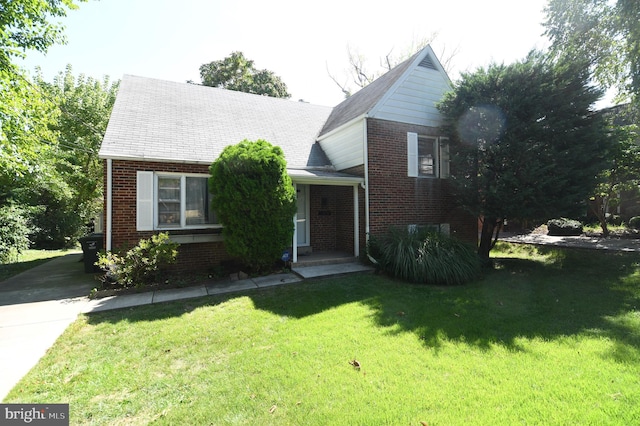 view of front of home with a front yard