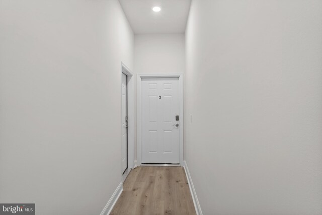 hallway featuring light wood-type flooring