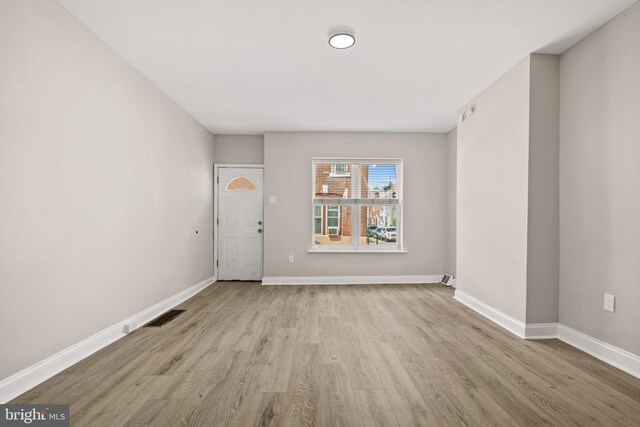 entrance foyer with light hardwood / wood-style floors