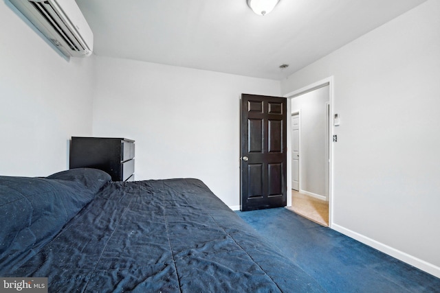 carpeted bedroom featuring a wall mounted air conditioner