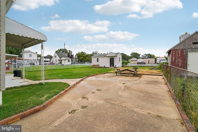 view of patio / terrace featuring a carport