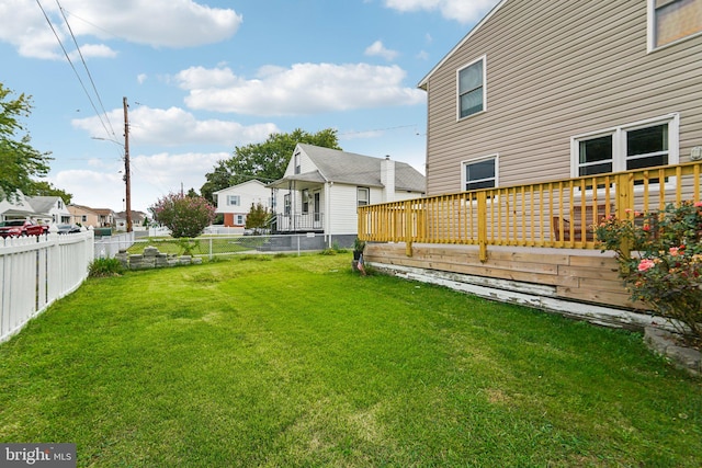 view of yard featuring a deck