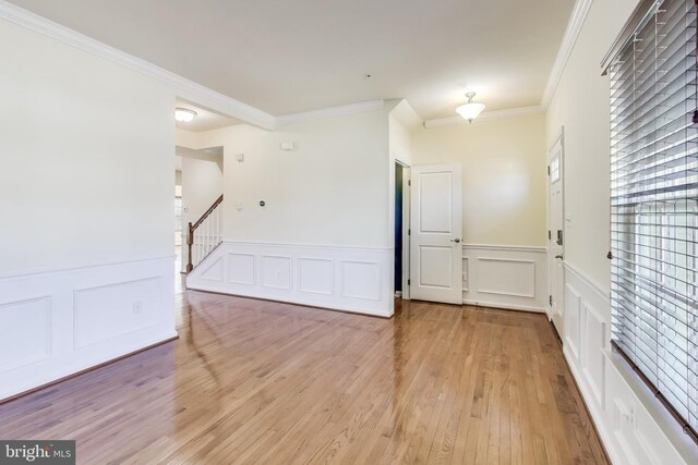 details with dishwasher, hardwood / wood-style flooring, and sink