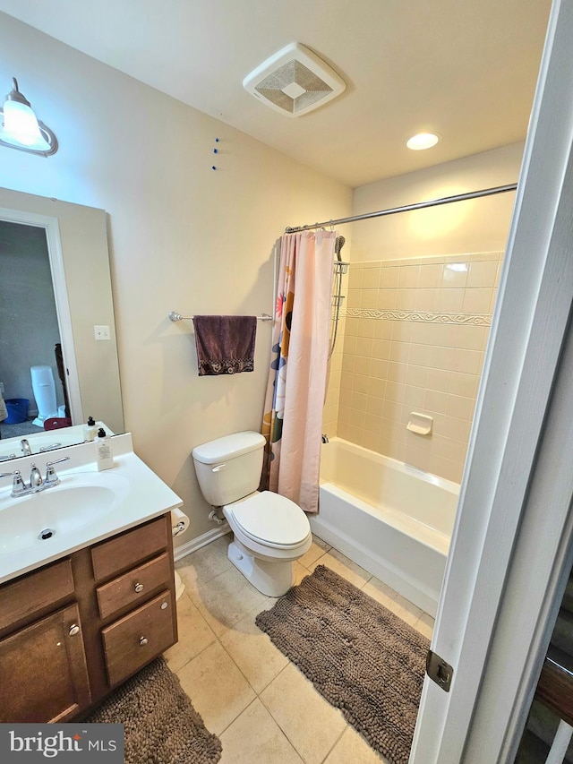 full bathroom featuring vanity, toilet, shower / tub combo, and tile patterned floors