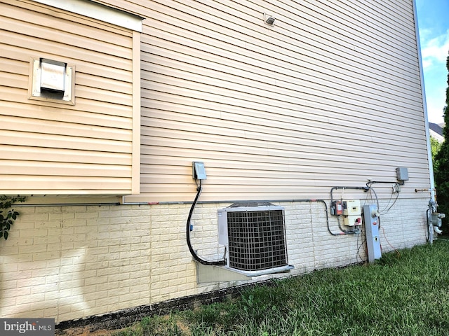 view of side of property featuring cooling unit