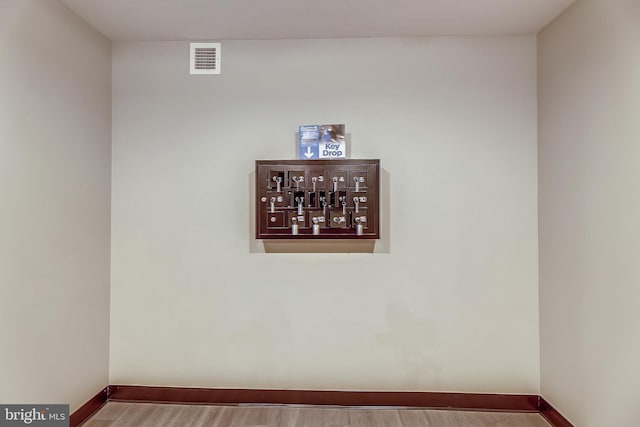 interior details featuring wood-type flooring