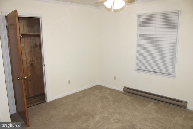 unfurnished bedroom with ornamental molding, carpet, baseboards, baseboard heating, and ceiling fan