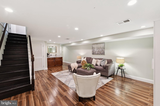 living room featuring dark hardwood / wood-style flooring