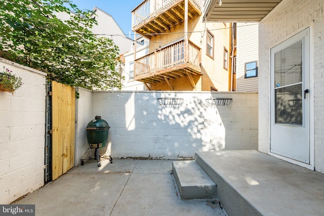 view of patio / terrace with a balcony