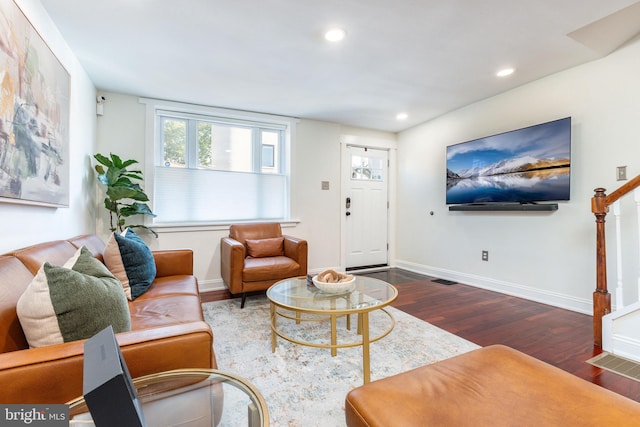 living room with dark wood-type flooring