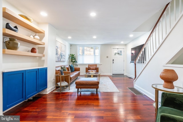 living room featuring dark hardwood / wood-style floors