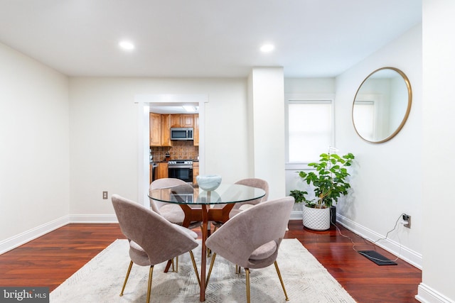 dining room featuring dark hardwood / wood-style floors