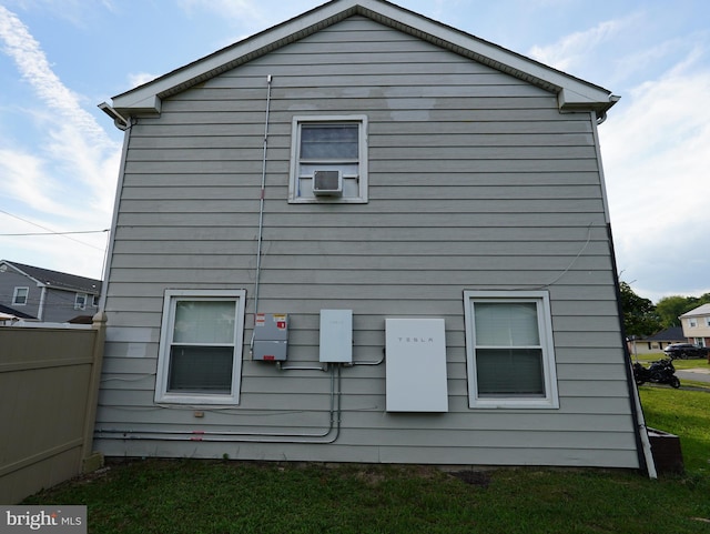 exterior space featuring a yard and cooling unit