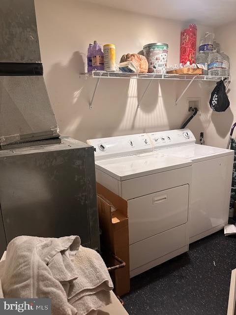 washroom with washer and clothes dryer