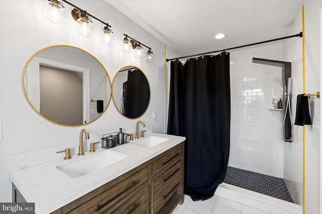 bathroom featuring vanity, curtained shower, and tile patterned floors