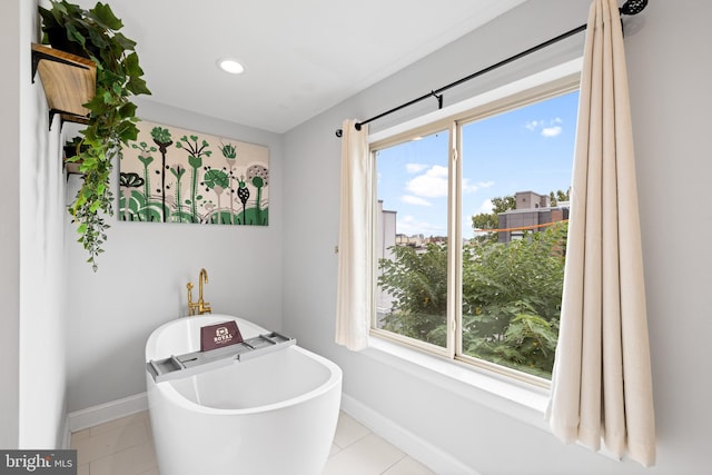 bathroom featuring a tub and tile patterned floors