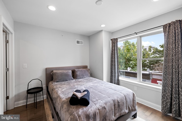 bedroom featuring hardwood / wood-style flooring