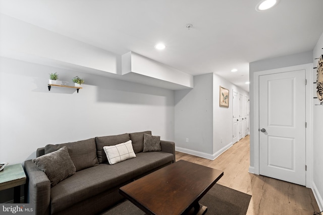 living room with light hardwood / wood-style floors