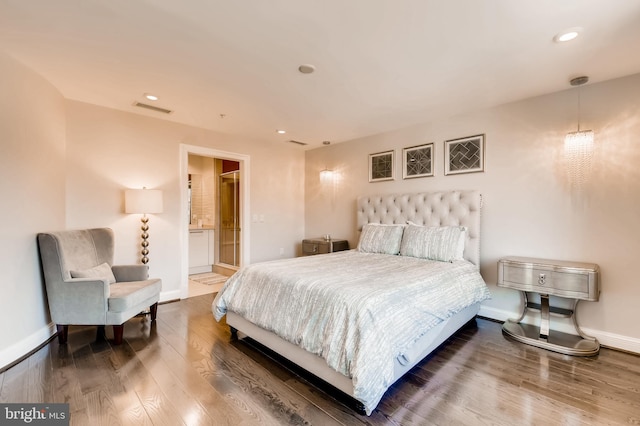 bedroom with recessed lighting, visible vents, baseboards, and wood finished floors