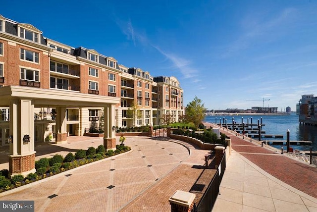 view of home's community featuring a water view