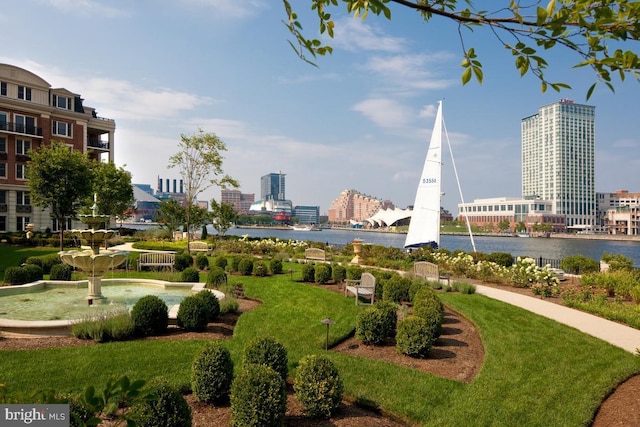 view of home's community with a view of city and a water view