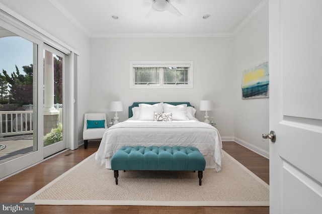 bedroom with baseboards, access to outside, wood finished floors, and crown molding