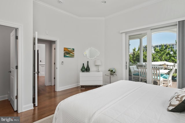 bedroom with access to exterior, crown molding, baseboards, and wood finished floors