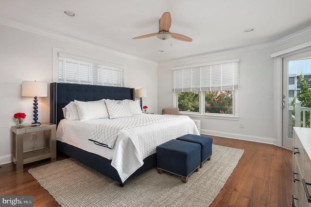 bedroom with ornamental molding and multiple windows