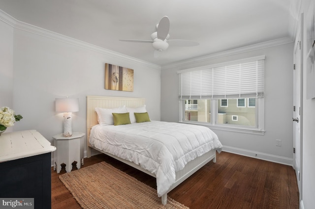 bedroom with a ceiling fan, baseboards, ornamental molding, and wood finished floors