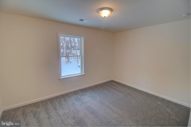 empty room with carpet floors