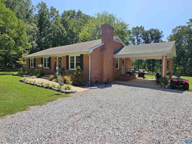 ranch-style home with a front yard