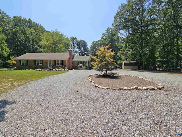 single story home featuring a front yard