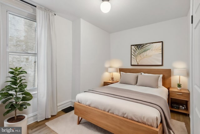 bedroom featuring light wood-type flooring