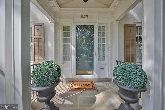 entrance to property with covered porch