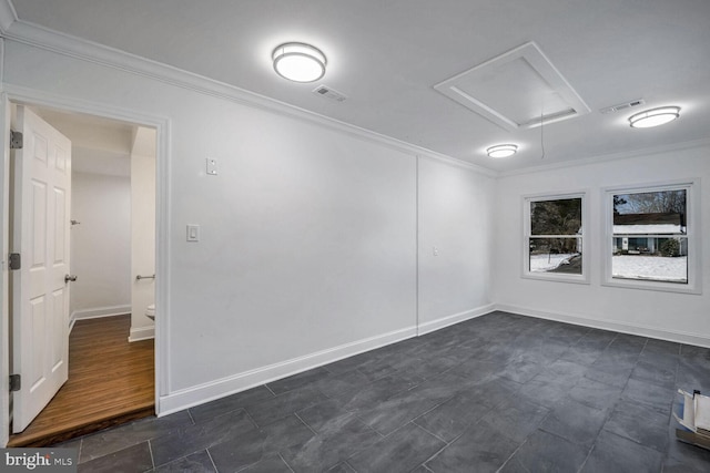 unfurnished room featuring crown molding