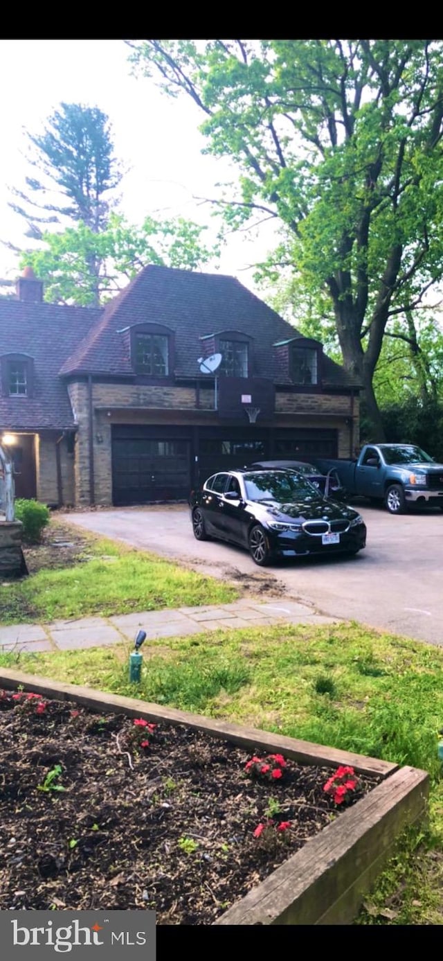 view of property exterior with a garage