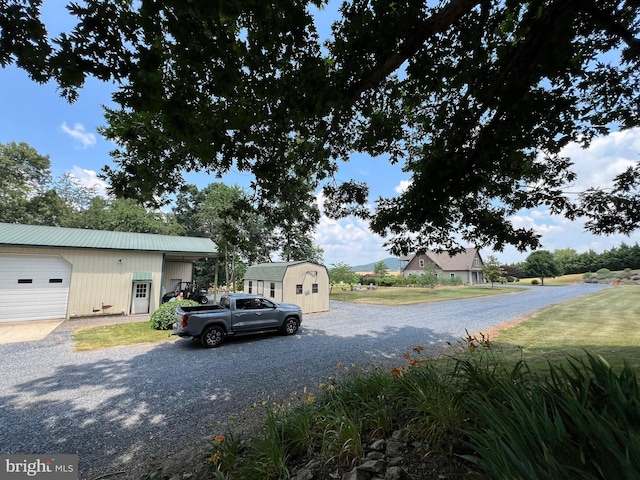 view of road featuring driveway