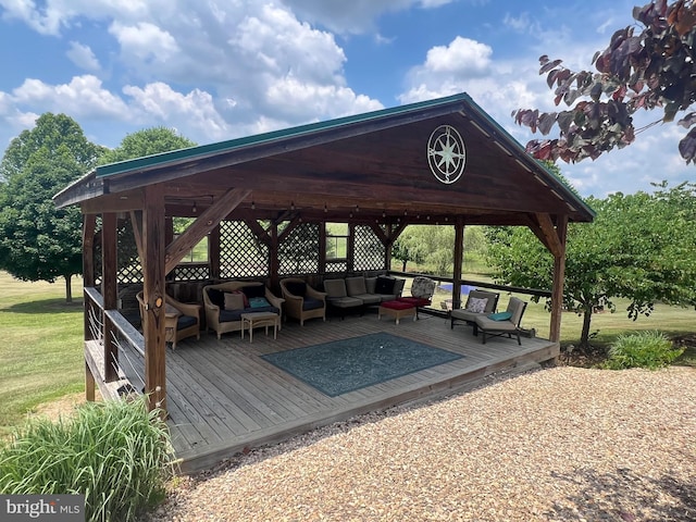 exterior space featuring a gazebo, an outdoor living space, a yard, and a wooden deck