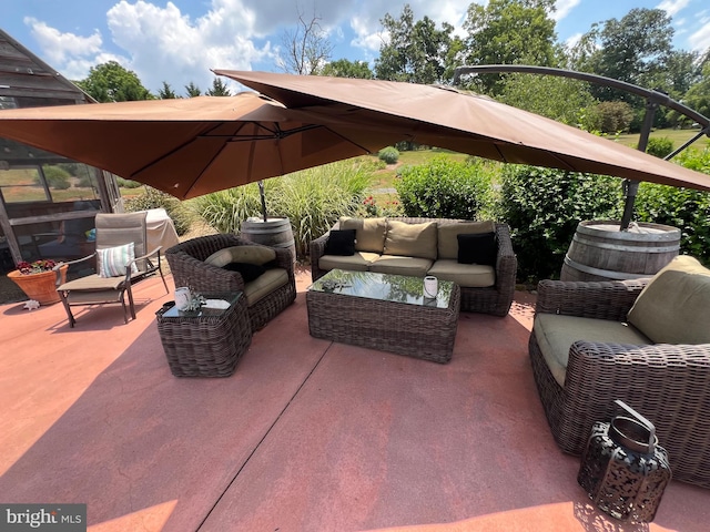 view of patio / terrace featuring an outdoor living space and a grill