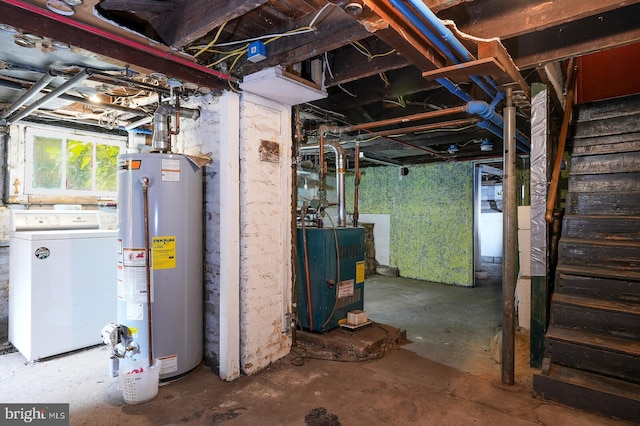 basement featuring washer / clothes dryer and gas water heater