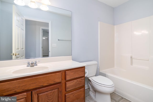 full bathroom with vanity, shower / bathtub combination, and toilet