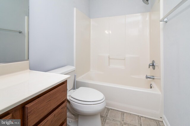 full bathroom featuring toilet,  shower combination, and vanity